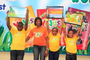 Brand Manager, Yojus Fruit Drink, Foluke Makinde (middle) flanked by winners in the Yojus Painting contest; Iyoha Peculiar (left); Chiziteram Onyia (3rd left) and Franc Uche Egbuchelam (right) at the ‘Yojus Painting Star Contest’, organized by Ranona, on Saturday, October 24, 2015, at the NAN Media Centre,  National Theatre Complex,  Iganmu, Lagos