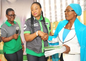 L-R:Mrs. Kikanwa Akpenyi, Head, Customer Engagement, Heritage Bank Limited; Mrs. Moji  Niran – Oladunni, Divisional Head, Public Sector, Heritage Bank Limited; and Mrs. Silifat Nike Jaiyeola, Principal, University of Ilorin Secondary School, receiving a set of books presented to the school by Heritage Bank as part of the 2016 Financial Literacy Day programme organized by the Bank in Ilorin on Thursday.