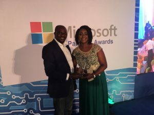 L-R: Managing Director, Reliance Infosystem, Olayemi Popoola; and SMS&P Group Director, Microsoft Nigeria, Wemimo Adeniyi, at the recently held Partners’ awards in Lagos. - 789marketing