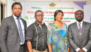 L-R: Melvin Awolowo, acting communication manager, Stanbic IBTC; Goddie Ofose, chairman, Brand Journalists’ Association of Nigeria (BJAN)Ms Clara Okoro,Vice Chairman,BJAN and Bennet Frimpong, marketing manager, personal and business banking, Stanbic IBTC, at the press conference to announce the 4th annual brand & marketing conference with the theme “ Mobile Money in Nigeria” held in Lagos. PHOTO;AKEEM SALAU - 789marketing